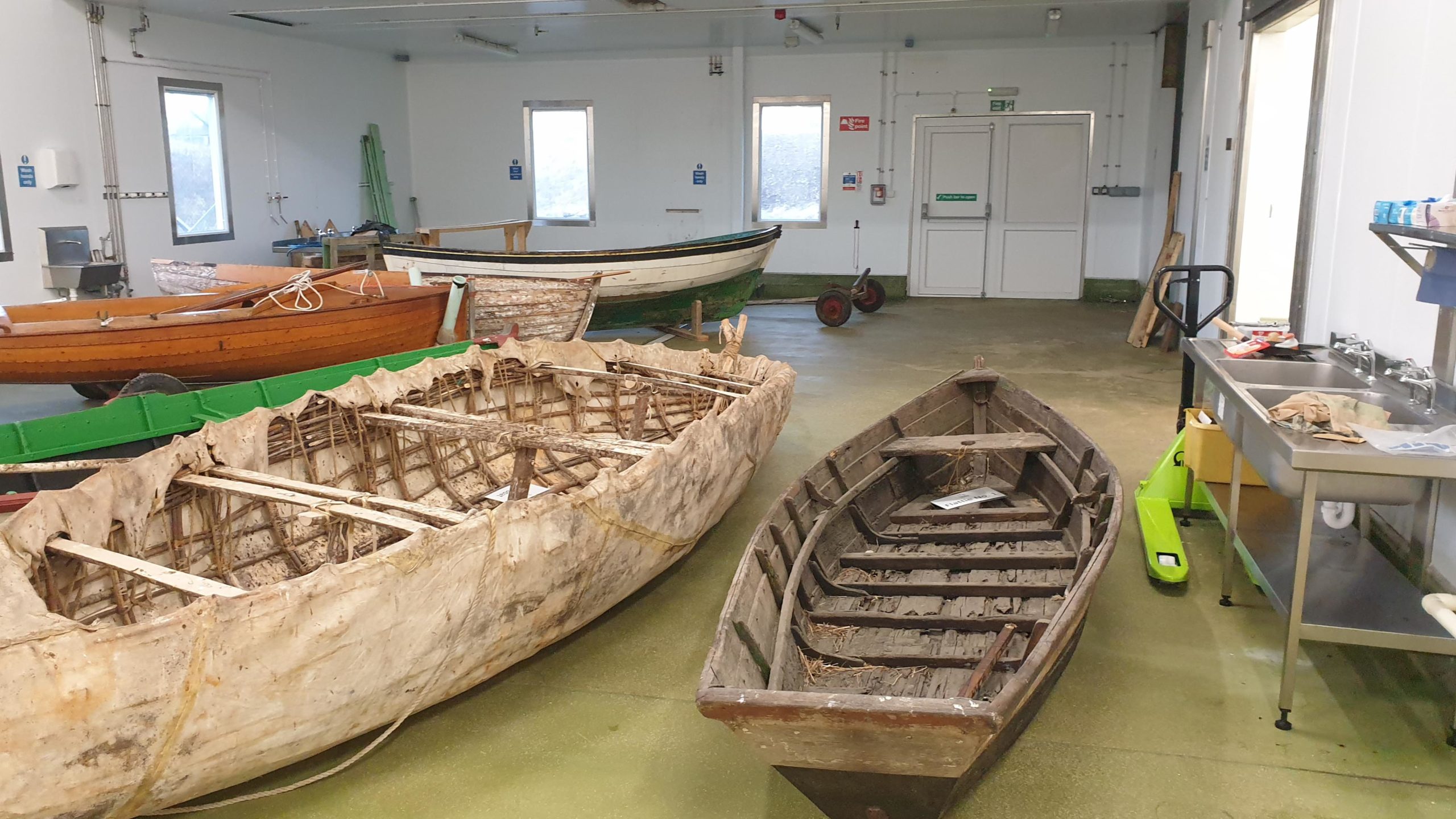 Boats moving into the new storage facility, December 2022