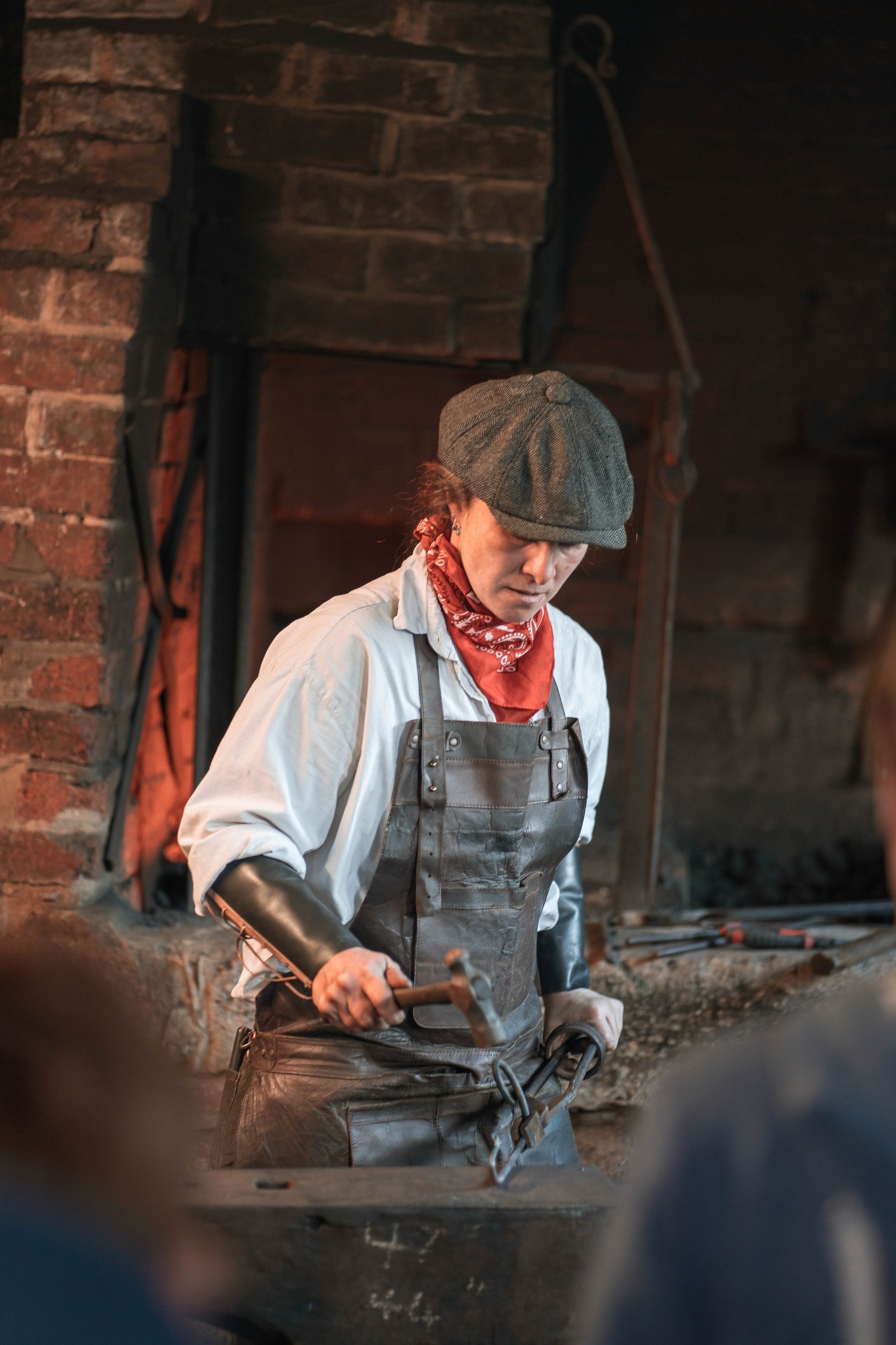 Blacksmith Ems working in the forge